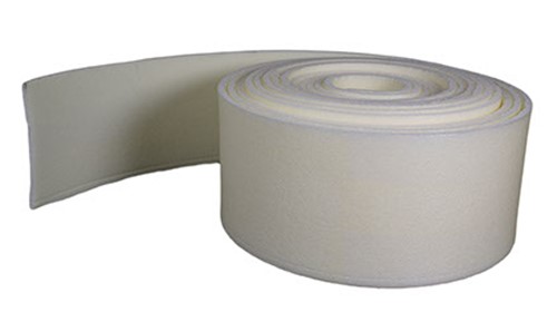 Polyethylene foam expansion joint filler, undercut and perforated to form a near mastic joint.