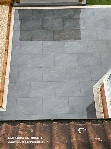 Beautiful stone affect porcelain in a dark grey smooth finish